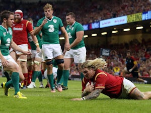 Wales's hooker Richard Hibbard scores a try during the 2015 Rugby World Cup warm up rugby union match between Wales and Ireland at The Millennium Stadium in Cardiff, south Wales on August 8, 2015. The 2015 Rugby World Cup begins on September 18, 2015,