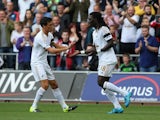 Bafetimbi Gomis celebrates scoring Swansea's opener against Newcastle on August 15, 2015