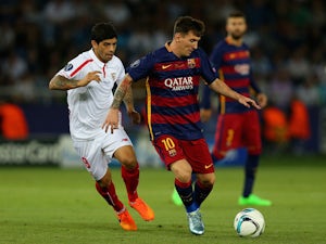 Messi magic puts Barca in front