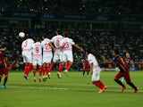 Lionel Messi of Barcelona scores their second goal from a free kick during the UEFA Super Cup between Barcelona and Sevilla FC at Dinamo Arena on August 11, 2015