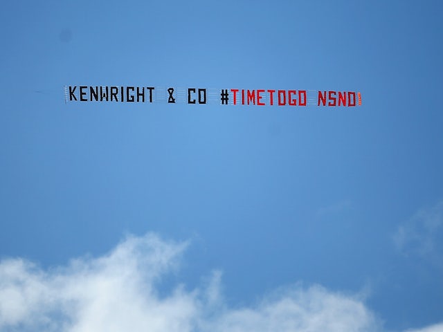 A banner calling for Everton chairman Bill Kenwright to leave the club is flown over St Mary's on August 15, 2015