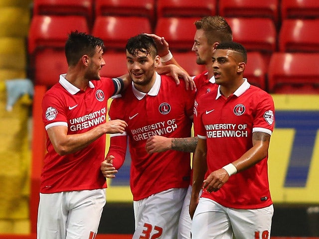 Tony Watt of Charlton Athletic celebrates scoring a goal during the Capital One Cup First Round match between Charlton Athletic v Dagenham & Redbridge at The Valley on August 11, 2015