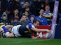 Danny McGuire of Leeds Rhinos scores a try during the Round 2 match of the First Utility Super League Super 8s between Leeds Rhinos and Wigan Warriors at Headingley Carnegie Stadium on August 14, 2015