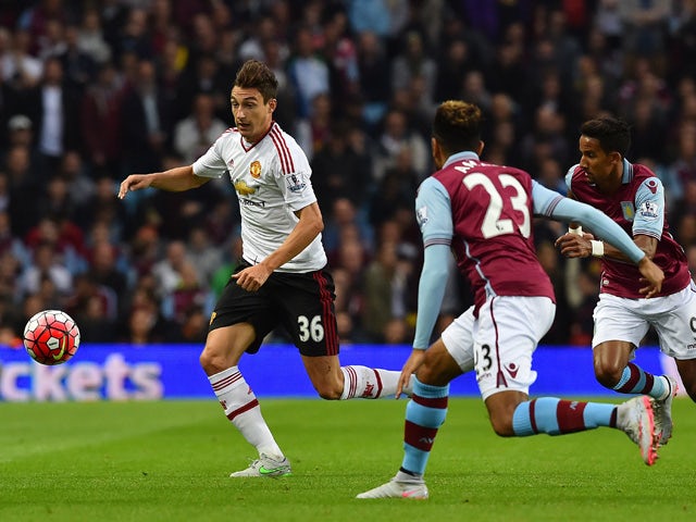 Manchester United's Italian defender Matteo Darmian in action during the English Premier League football match between Aston Villa and Manchester United at Villa Park in Birmingham, central England, on August 14, 2015