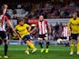 John Mullins of Oxford United scores Oxford's 4th goal during the Capital One Cup First Round match between Brentford and Oxford United at Griffin Park on August 11, 2015