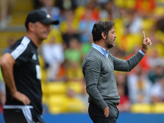 Quique Flores gives his Watford side the finger during their game with West Brom on August 15, 2015