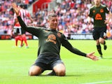 Ross Barkley opts for jazz hands as he celebrates scoring Everton's third against Southampton on August 15, 2015