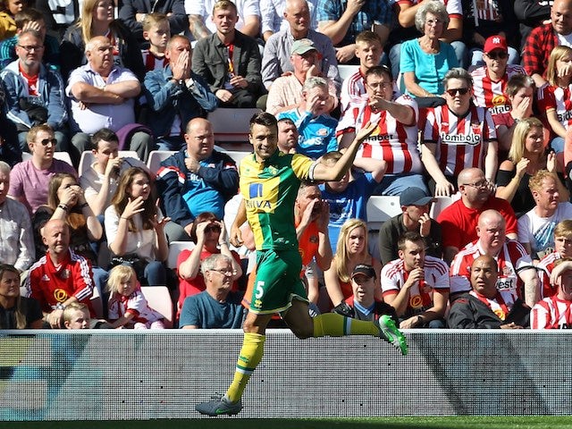 Norwich's Russell Martin celebrates scoring the opener against Sunderland on August 15, 2015