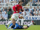 Ruud van Nistelrooy celebrates scoring for Manchester United on August 23, 2003