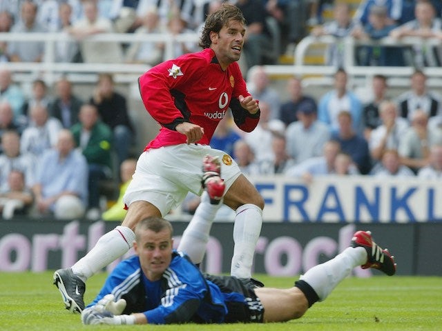 Ruud van Nistelrooy celebrates scoring for Manchester United on August 23, 2003