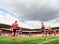 Southampton players warm up ahead of the game with Everton on August 15, 2015