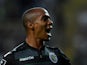 Sporting's forward Joao Mario celebrates after scoring the opening goal during the Portuguese Liga football match CD Tondela vs SC Sporting at the Aveiro City stadium in Aveiro on August 14, 2015