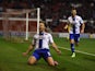 Tom Bradshaw of Walsall celebrates scoring the winning goal during the Capital One Cup First Round match between Nottingham Forest and Walsall at City Ground on August 11, 2015