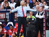Arsenal boss Arsene Wenger gesticulates during his side's game with Crystal Palace on August 16, 2015