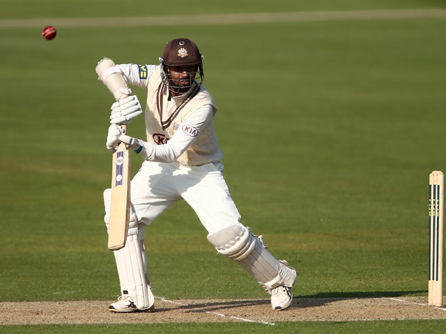 Arun Harinath of Surrey hits out during day one of the LV County Championship second division match between Kent and Surrey at St. Lawrence Ground on May 4, 2014