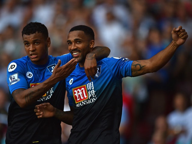 Bournemouth's Norwegian striker Joshua King and Bournemouth's English striker Callum Wilson (R) celebrate Wilson's early goal during the English Premier League football match between West Ham United and Bournemouth at The Boleyn Ground in Upton Park, East