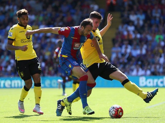 Glenn Murray of Crystal Palace and Ciaran Clark of Aston Villa compete for the ball during the Barclays Premier League match between Crystal Palace and Aston Villa at Selhurst Park on August 22, 2015