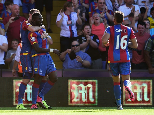 Bakary Sako of Crystal Palace celebrates scoring his team's second goal with his team mate Jordon Mutch (L) during the Barclays Premier League match between Crystal Palace and Aston Villa at Selhurst Park on August 22, 2015