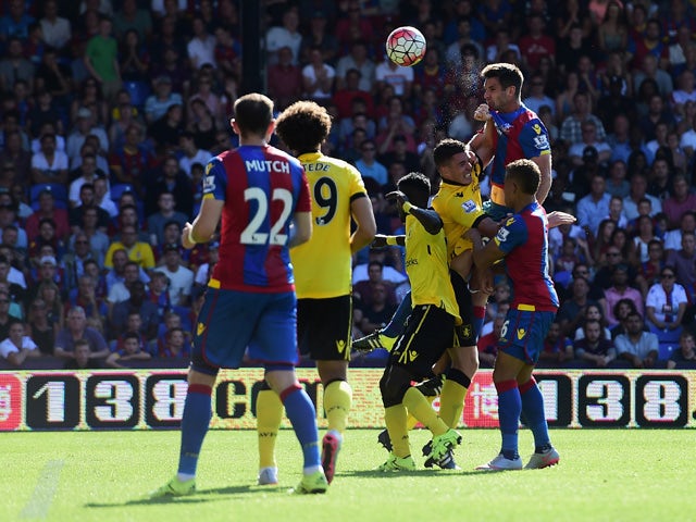 Scott Dann of Crystal Palace heads to score his team's first goal during the Barclays Premier League match between Crystal Palace and Aston Villa at Selhurst Park on August 22, 2015