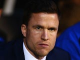 Gary Caldwell new manager of Wigan Athletic looks on prior to the Sky Bet Championship match between Fulham and Wigan Athletic at Craven Cottage on April 10, 2015
