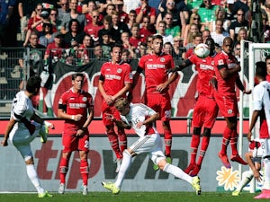 Calhanoglu stunner hands Leverkusen win