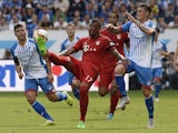 Hoffenheim's midfielder Kevin Volland and Bayern Munich's defender Jerome Boateng vie for the ball during the German first division Bundesliga football match 1899 Hoffenheim vs FC Bayern Munich, on August 22, 2015 
