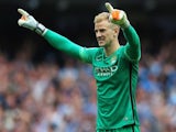 Man City keeper Joe Hart celebrates his side's second goal against Chelsea on August 16, 2015
