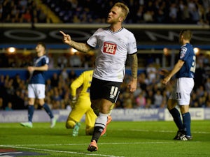 Johnny Russell of Derby County celebrates after he scores his teams opening goal during the Sky Bet Championship match between Birmingham City and Derby County at St Andrews (stadium) on August 21, 2015