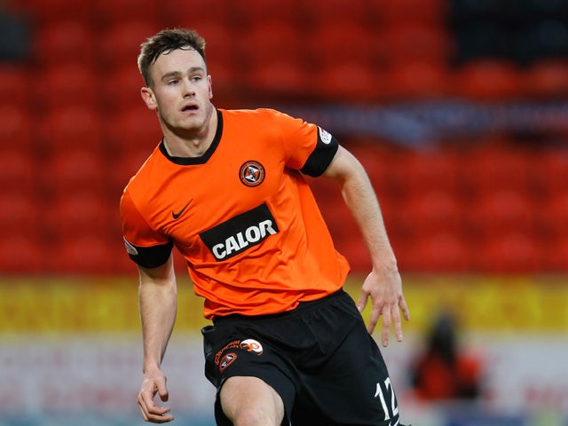 Keith Watson of Dundee United in action during the Scottish Premier League Match between Dundee United and St Mirren at Tannadice Park on December 30, 2012
