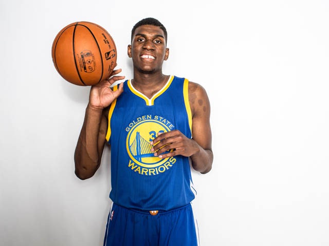 Kevon Looney #36 of the Golden State Warriors poses for a portrait during the 2015 NBA rookie photo shoot on August 8, 2015