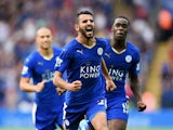 Riyad Mahrez of Leicester City celebrates scoring his team's first goal during the Barclays Premier League match between Leicester City and Tottenham Hotspur at The King Power Stadium on August 22, 2015
