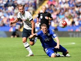 Harry Kane of Tottenham Hotspur and Robert Huth of Leicester City compete for the ball during the Barclays Premier League match between Leicester City and Tottenham Hotspur at The King Power Stadium on August 22, 2015