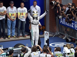 Hamilton produces comfortable win at Spa