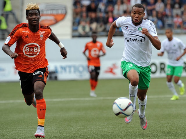 Lorient's forward Ibrahim Didier Ndong (L) vies with Saint-Etienne's French defender Pierre-Yves Polomat during the French L1 football match between Lorient and Saint-Etienne on August 23, 2015