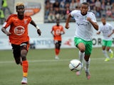 Lorient's forward Ibrahim Didier Ndong (L) vies with Saint-Etienne's French defender Pierre-Yves Polomat during the French L1 football match between Lorient and Saint-Etienne on August 23, 2015