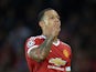 Manchester United's Dutch midfielder Memphis Depay celebrates after scoring his team's second goal during the UEFA Champions League play off football match between Manchester United and Club Brugge at Old Trafford in Manchester, north west England, on Aug