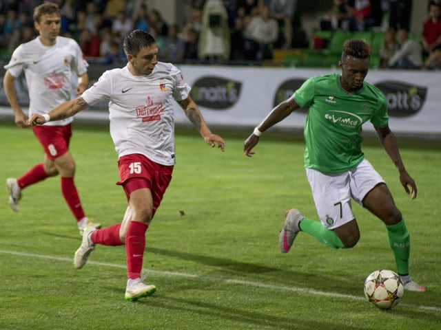 Milsami Orhei's defender Denis Rassulov vies with Saint-Etienne's forward Jean-Christophe Bahebeck during the UEFA Europa League playoff first leg football match between FC Milsami Orhei and AS Saint-Etienne in Chisinau on August 20, 2015