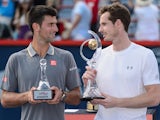 Novak Djokovic and Andy Murray pose with their trophies after the Rogers Cup on August 16, 2015