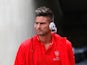 Olivier Giroud listens to Cher's greatest hits as he arrives at Selhurst Park ahead of Arsenal's game with Crystal Palace on August 16, 2015