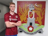 Northampton Town new loan signing Ryan Watson poses during a photo call at Sixfields Stadium on August 20, 2015
