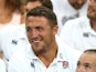 Sam Burgess of England looks on from the stands during the International match between France and England at Stade de France on August 22, 2015