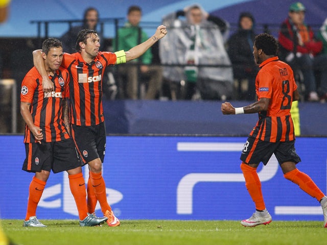 Players of Donetsk celebrate after scoring during the UEFA Champions League: Qualifying Round Play Off First Leg match between SK Rapid Vienna and FC Shakhtar Donetsk on August 19, 2015