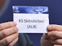 The name KS Skenderbeu is seen during the UEFA Champions League Q2 qualifying round draw at the UEFA headquarters on June 24, 2013