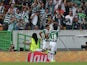 Sporting's forward Teofilo Gutierrez celebrates scoring a goal with Sporting's forward Andre Carrillo during the UEFA Champions League qualifying round play-off first leg match between Sporting CP and CSKA Moscow at Estadio Jose Alvalade on August 18, 201