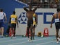 Jamaica's Usain Bolt (2L) reacts after making a false start in the final of the men's 100 metres at The International Association of Athletics Federations (IAAF) World Championships in Daegu on August 28, 2011