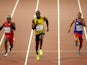 Mike Rodgers of the United States, Usain Bolt of Jamaica and Reza Ghasemi of Iran compete in the Men's 100 metres heats during day one of the 15th IAAF World Athletics Championships Beijing 2015 at Beijing National Stadium on August 22, 2015