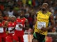 Usain Bolt cruises into 200m semi-finals
