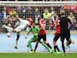 Andre Ayew of Swansea City scores past Sergio Romero of Manchester United during the Barclays Premier League match between Swansea City and Manchester United at Liberty Stadium on August 30, 2015