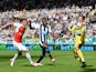 Newcastle United's Dutch goalkeeper Tim Krul (R) makes a save from Arsenal's French striker Olivier Giroud (L) during the English Premier League football match between Newcastle United and Arsenal at St James' Park in Newcastle-upon-Tyne, north east Engla