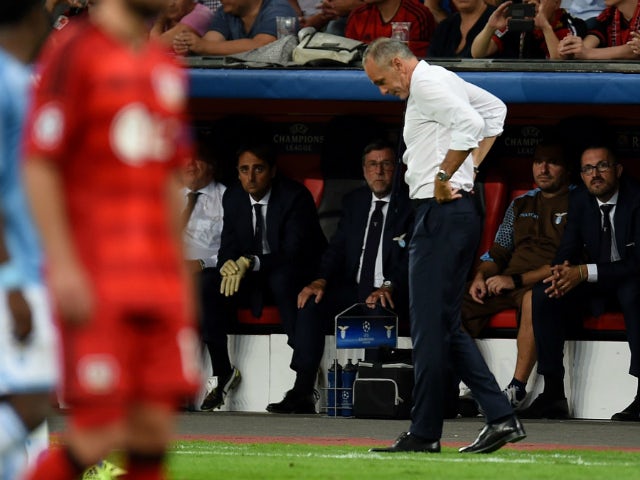 Lazio's headcoach Stefano Pioli reacts during the UEFA Champions League playoff football match between Bayer Leverkusen and SS Lazio, in Leverkusen, western Germany, on August 26, 2015